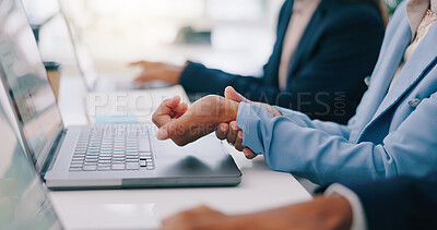 Buy stock photo Business people, closeup and woman with wrist pain in office from laptop, strain or problem. Hands, injury and female manager online with carpal tunnel, arthritis and fibromyalgia or osteoporosis