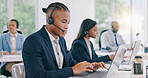 Business people, telemarketing and call center with laptop, black man and customer service. Staff, group or professional with headphones, typing and internet with advice, tech support and help desk