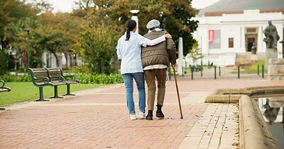 Nurse, relax and park with old woman and walking stick for retirement, elderly care and physical therapy. Trust, medical and healthcare with senior patient and caregiver in nature for rehabilitation