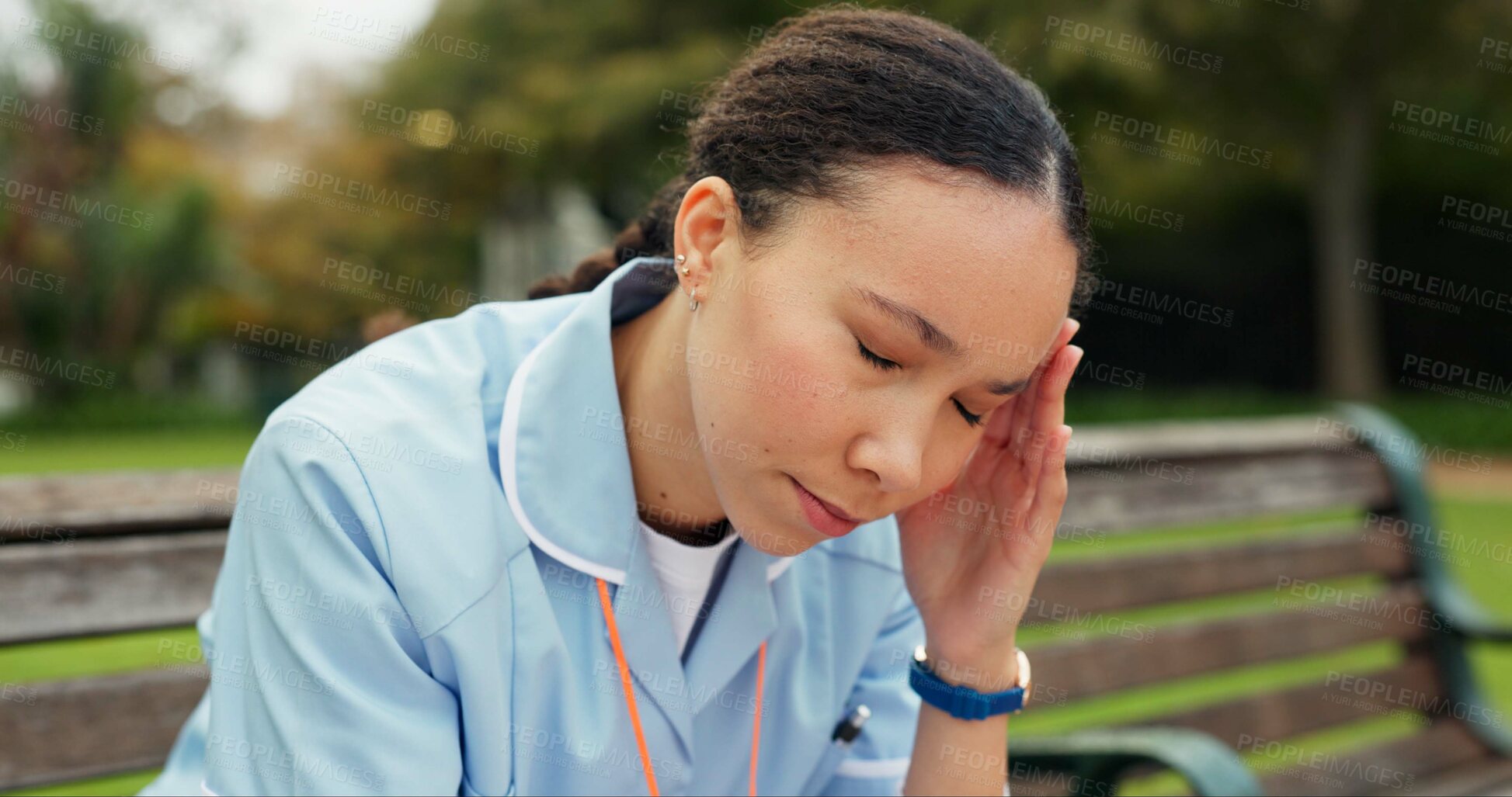 Buy stock photo Headache, tired and nurse with woman on park bench for thinking, fatigue and burnout. Mental health, anxiety and stress with female person in nature for frustrated, exhausted and healthcare problem