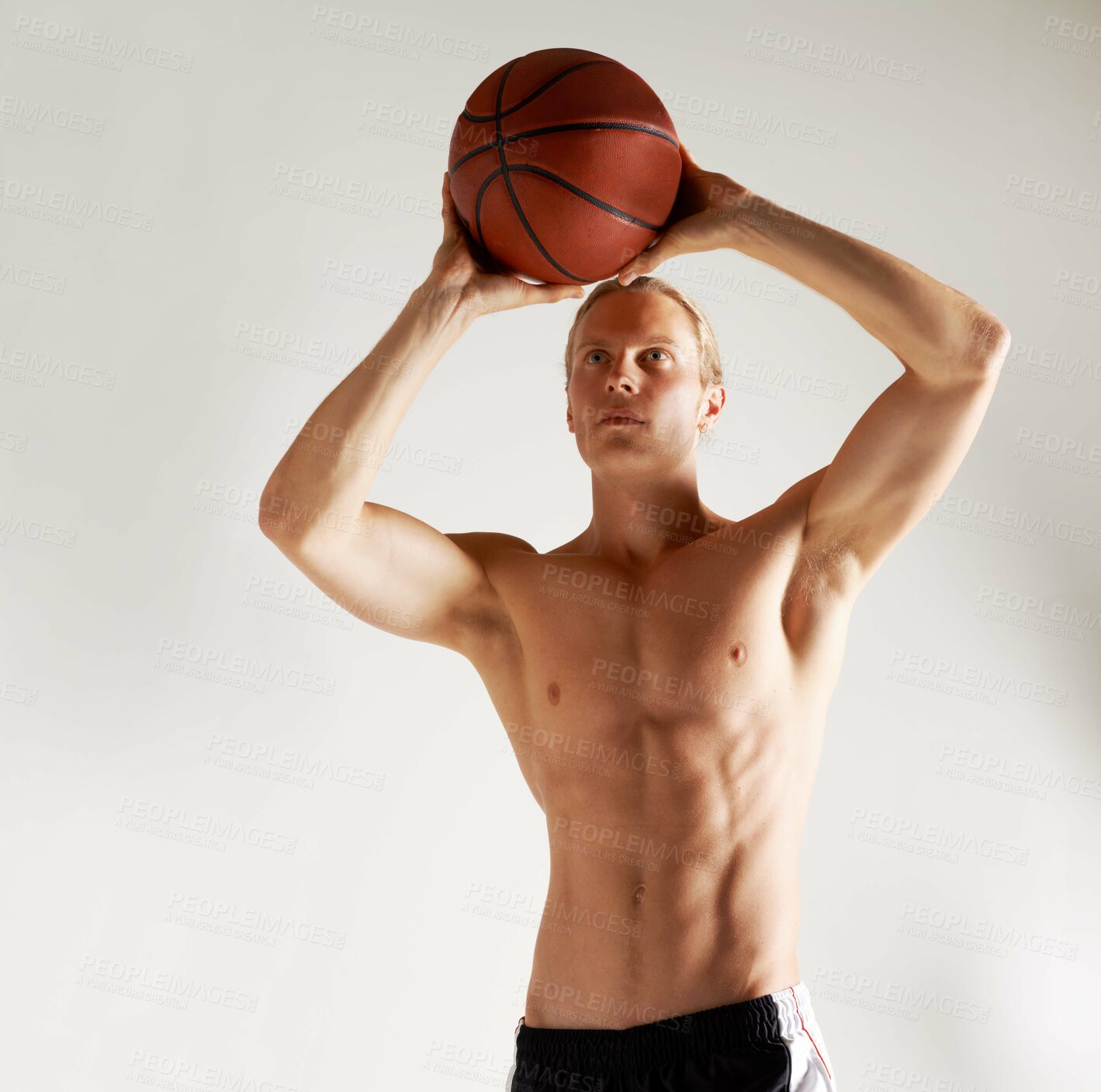 Buy stock photo Basketball, shirtless and man with exercise, health and training on a white studio background. Person, model or athlete with competition, topless or muscle with workout, talent or player with fitness