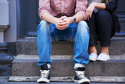 Buy stock photo Love, stairs and shoes of couple in city for date, cute relationship and bonding outdoors on weekend. Dating, romance and feet of man and woman embrace for flirting, affection and care in urban town