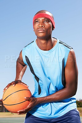 Buy stock photo Man, serious and basketball outdoor for sport, fitness and wellness with training, workout or exercise. Athlete, black person and ball for match, competition or performance with sportswear and skill