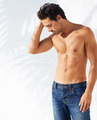 Buy stock photo Thinking, calm and man body by a white wall outdoor in the sun with freedom and ideas. Relax, peace and male person with mockup and summer with vitamin D, leaning and contemplating with outfit