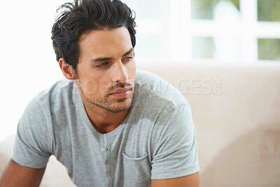 Buy stock photo Thinking, depression and face of man on sofa with stress, anxiety or broken heart at home. Fail, crisis or male person in living room overthinking, disaster or lonely, worry or disappointed in house