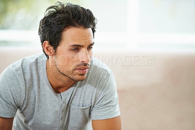 Buy stock photo Sad man, thinking and depression on a sofa with stress, anxiety or broken heart at home. Fail, crisis or male person in living room overthinking, disaster or lonely, worried or disappointed in house