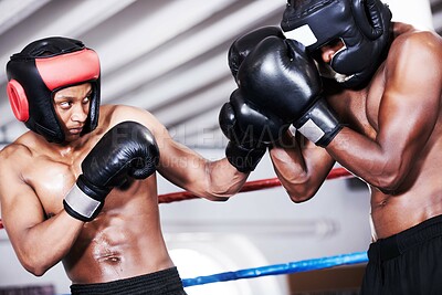 Buy stock photo Boxing, black man and sparring partner in ring together with headgear, gloves and fitness, power training, challenge. Strong body, fighting and boxer in helmet, fearless and confident in competition.