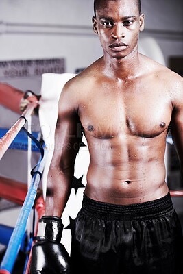 Buy stock photo Boxing, power and portrait of black man in ring with fitness, gloves and workout challenge at sports club. Strong body, face of athlete or boxer in gym with sweat and confidence in competition fight.