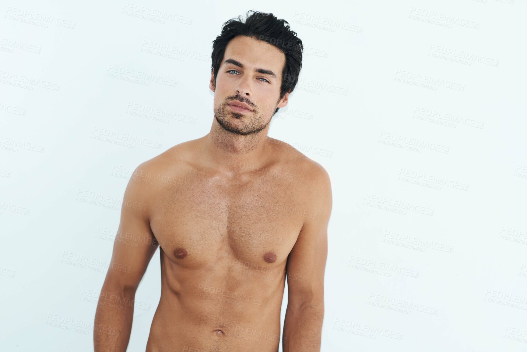 Buy stock photo Portrait, body and muscle with a sexy man in studio on a white background for masculine desire. Shirtless, tattoo and manly with a handsome young male model posing topless for rugged sensuality