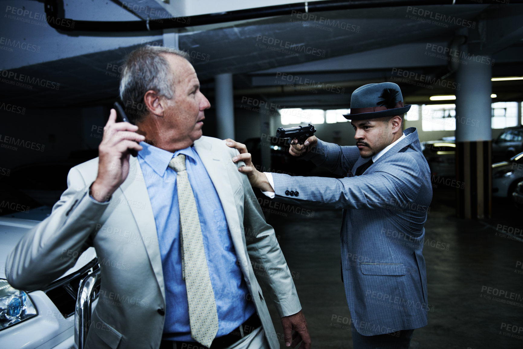 Buy stock photo Parking lot, crime and business man with gun point robbery, kidnap or ransom, danger or threat. Violence, ganger or mature male entrepreneur with fear, stress and anxiety for mafia, mob or terror