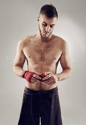 Buy stock photo Shot of an MMA fighter in the studio