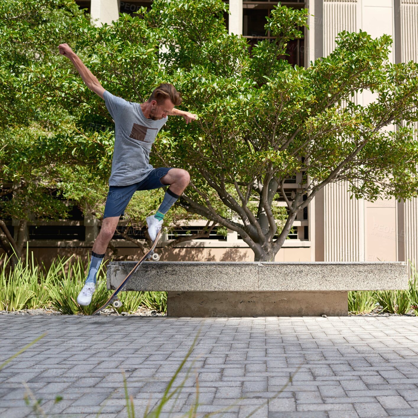 Buy stock photo Shot of skateboarders in the city