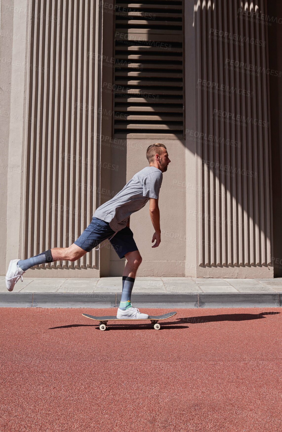 Buy stock photo Shot of skateboarders in the city