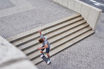 Buy stock photo Shot of skateboarders in the city