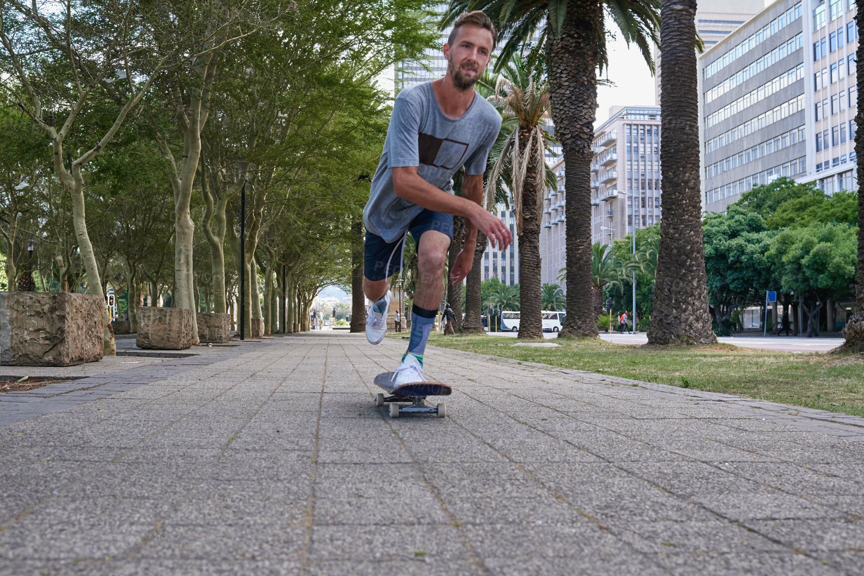 Buy stock photo Shot of skateboarders in the city