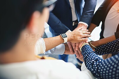Buy stock photo High angle shot of a group of coworkers' hands in a huddle