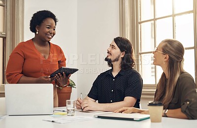 Buy stock photo Diverse business people meeting to discuss ideas, vision and strategy for project in a marketing agency. Happy team leader and smiling manager presenting startup plan on a digital tablet in an office