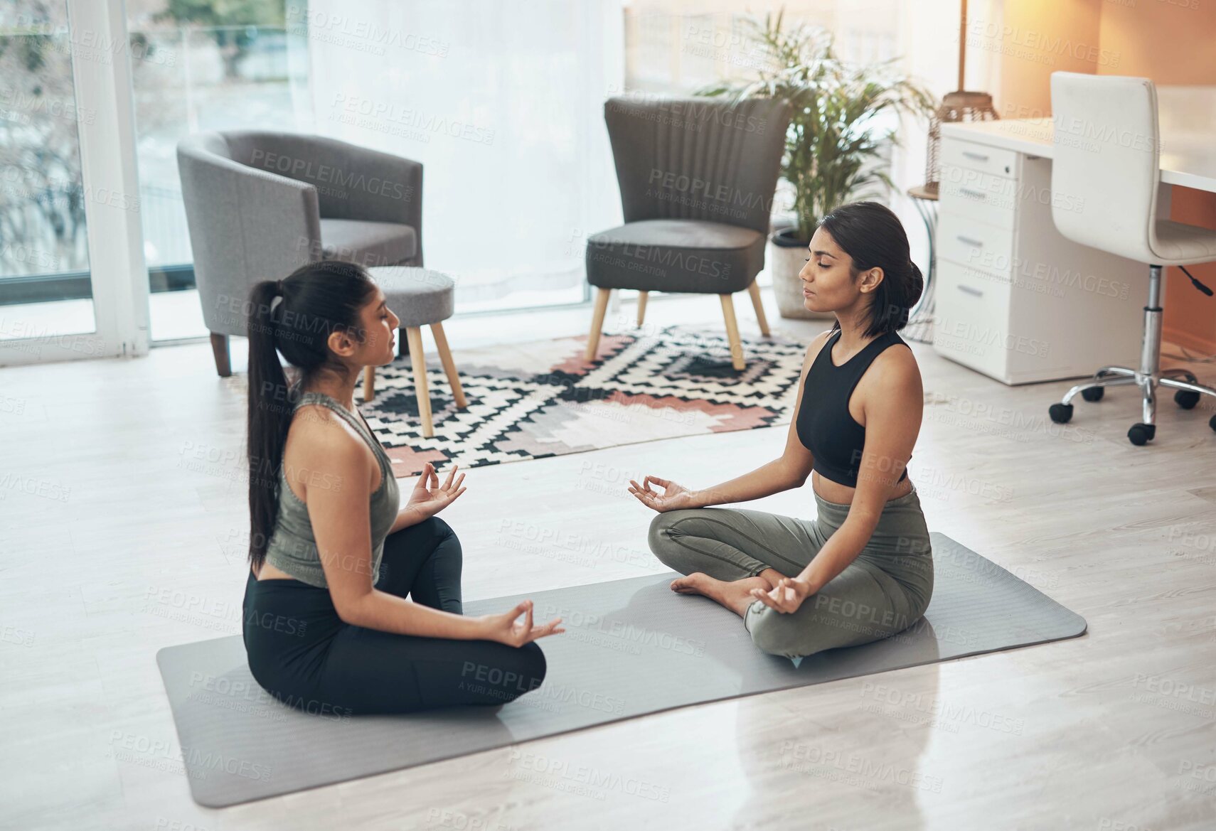 Buy stock photo Friends, meditate and women exercise together in a house for health, mindfulness or wellness. Indian people in a home for meditation workout, lotus pose and fitness with a partner for zen and peace