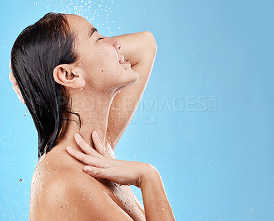 Buy stock photo Shower, hair care and Asian woman with water for cleaning, wellness and beauty on blue mockup studio background. Advertising, spa and model with care for body health and natural lifestyle with space