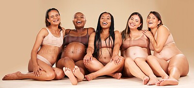 Buy stock photo Women group, studio portrait and pregnancy happiness with diversity, smile and solidarity by background. Support, pregnant friends and happy with excited face, future and sitting for hug by backdrop