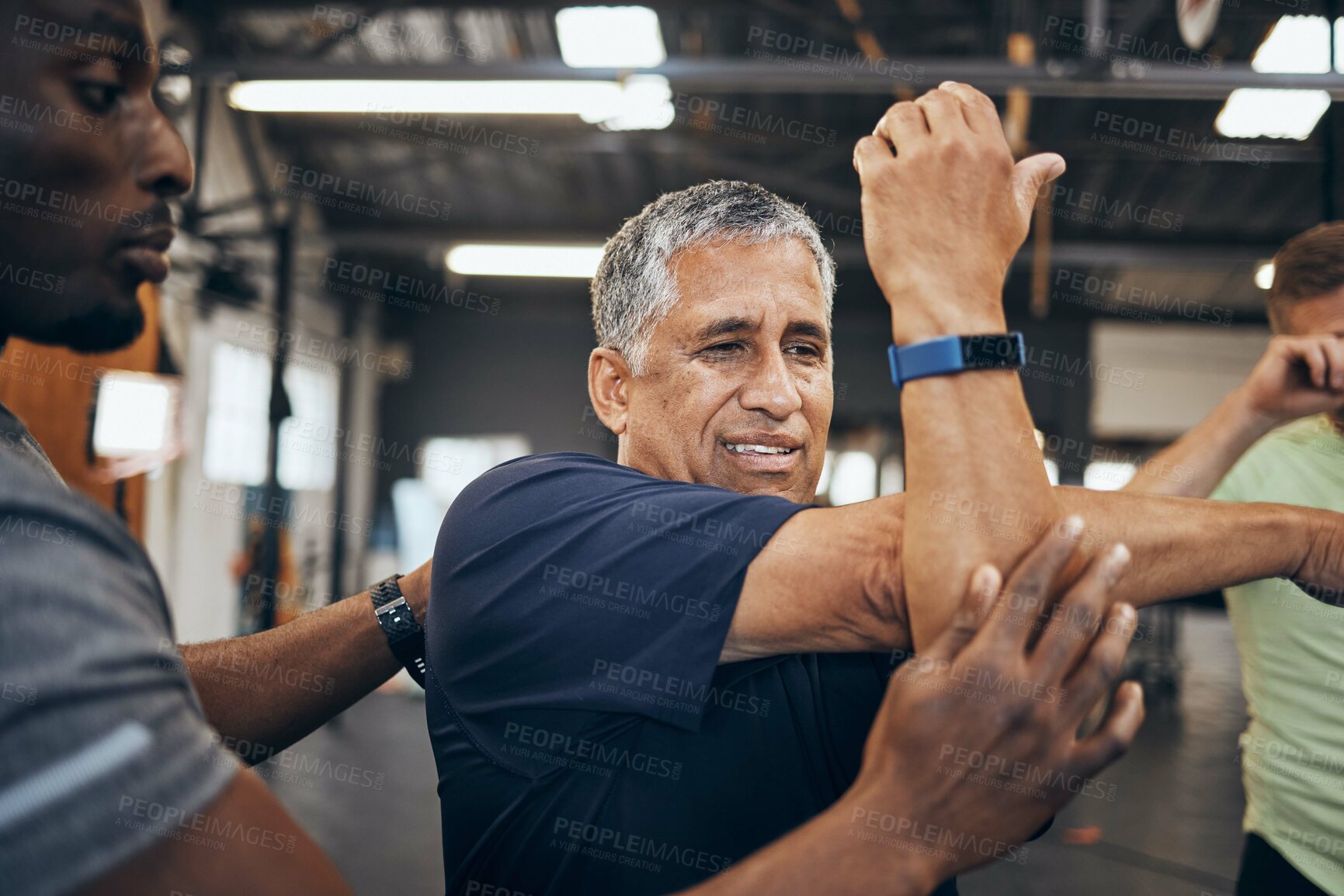 Buy stock photo Elderly man, gym and stretching with personal trainer for health, wellness and training with smartwatch. Men, workout motivation and exercise together for goals, muscle development or body healthcare