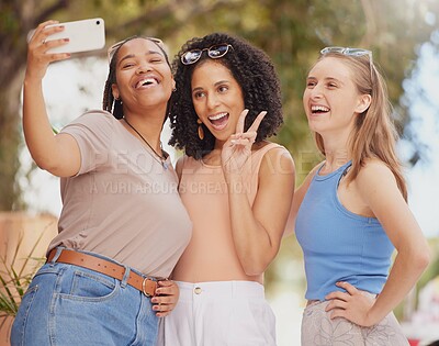 Buy stock photo Women friends, park selfie and peace sign with diversity, happy laugh and sunshine with smile on holiday. Black woman, girl or profile picture with solidarity, excited gen z students and social media