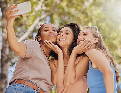 Buy stock photo Selfie, girl friends kiss and bonding of students together with travel and freedom. Outdoor, happiness smile and happy summer vacation taking social media profile picture in a park on holiday