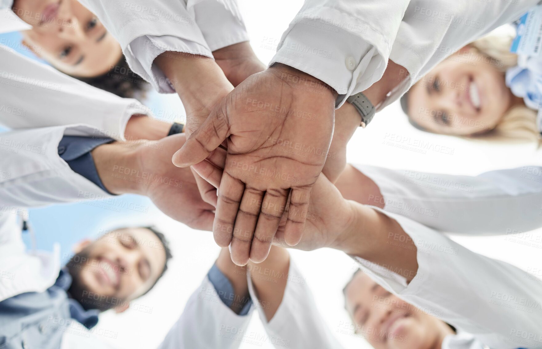 Buy stock photo Hand stack, doctors and below group with smile for motivation, success and team building in hospital. People, teamwork and hands together for solidarity, support and goals for healthcare in clinic