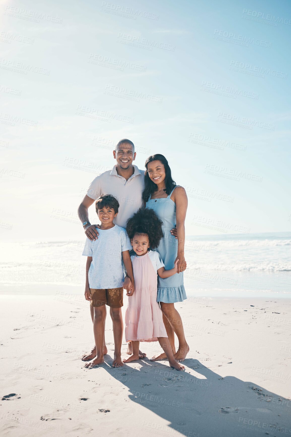 Buy stock photo Vacation, beach and portrait of happy family together at the sea or ocean bonding for love, care and happiness. Travel, sun and parents with children or kids on to relax in mockup space on holiday