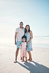 Summer, beach and portrait of happy family together at the sea or ocean bonding for love, care and happiness. Happy, sun and parents with child or kid on to relax for peace on outdoor holiday