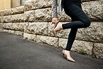 Hands, heels fix and business woman on road with shoes and job fashion on work commute. City travel, female professional and walking on urban pavement, street and sidewalk with legs and mockup space