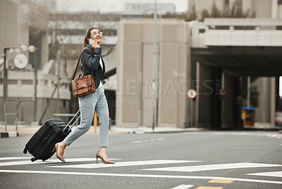 Buy stock photo Business travel, phone call and happy woman with luggage in city street, networking or work trip. Smartphone, conversation and lady on road crosswalk with suitcase for traveling appointment in London