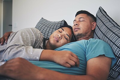 Buy stock photo Couple, sleeping and hug together in bed to relax, rest and cuddle in marriage, relationship or love for partner in morning. Tired, man and woman dreaming with peace in home, house or bedroom