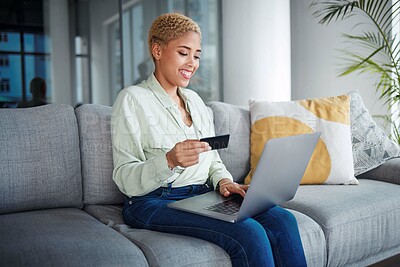 Buy stock photo Woman, laptop and credit card for home online shopping, fintech payment and e commerce on her sofa. African person on computer for internet banking, website subscription or application for loan