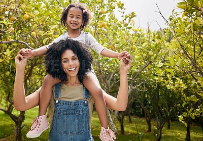 Buy stock photo Mother with kid, orchard and portrait, piggyback in nature and agriculture with healthy food and nutrition on farm. Farmer, woman and daughter time picking citrus fruit with lemon harvest and bonding