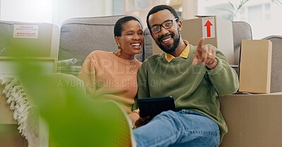 Buy stock photo African couple, pointing and new home with tablet, boxes and thinking with discussion, decision and choice. Black woman, man and floor for planning, moving or chat for real estate, property or house