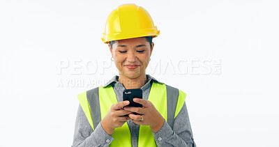 Buy stock photo Engineering, woman and phone for construction chat, communication and project management in studio. Asian contractor or builder typing on mobile for architecture design update on a white background