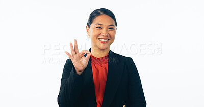 Buy stock photo Ok, hands and portrait of business woman in studio for vote, review and feedback on white background. Happy asian worker show okay for success, agreement and sign of support, yes emoji and excellence