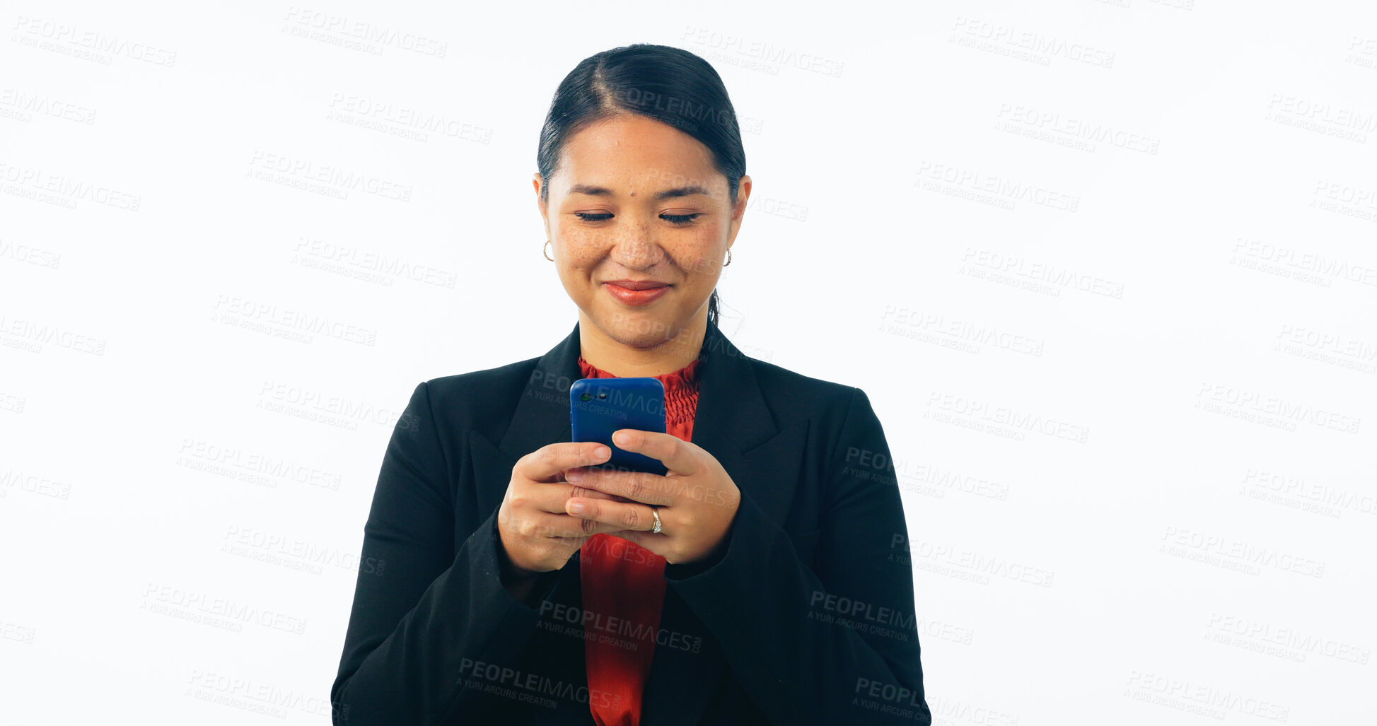 Buy stock photo Asian lawyer woman, smartphone and studio with smile, reading or texting client with ideas by white background. Japanese advocate, attorney or corporate legal expert with phone, typing and networking