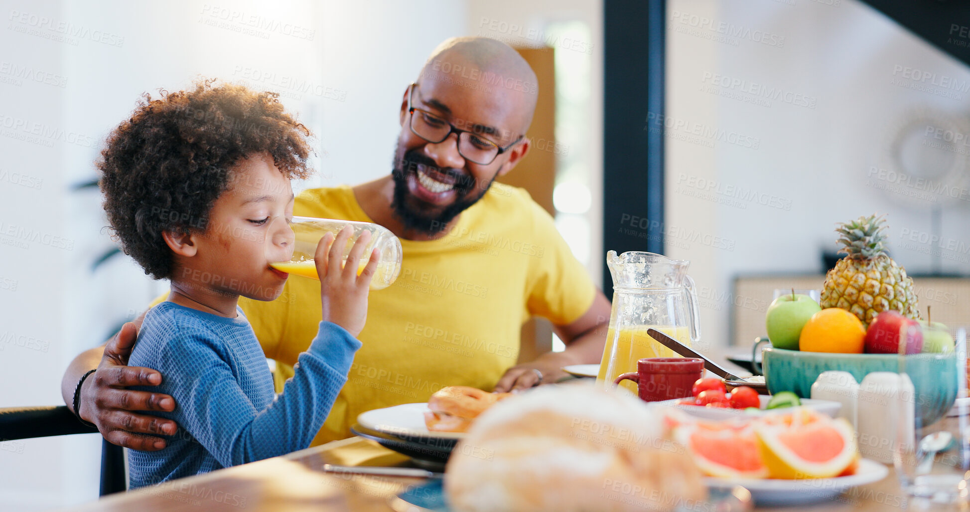 Buy stock photo Black family, juice and father with child for breakfast, lunch and eating together in home. Happy, parents and dad and boy at table for bonding with meal for health, nutrition and hunger in house