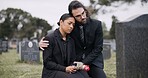 Sad couple, rose and graveyard in loss, grief or mourning at funeral, tombstone or cemetery. Man and woman hug with flower in depression, death or goodbye at memorial or burial service for loved one