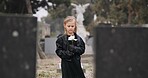 Flower, death or kid in cemetery for funeral. spiritual service or grave visit for repsect in Christian religion. Mourning, goodbye or sad girl child outside in graveyard for grief, loss or farewell