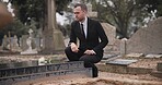 Funeral, cemetery and man with flower at tombstone for remembrance, burial ceremony and memorial service. Depression, death and person with rose for mourning, grief and loss in graveyard for respect