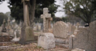 Funeral, empty graveyard and tombstones for death ceremony, religion or memorial service. Catholic symbol, background or Christian sign on gravestone for mourning, burial or loss in public cemetery