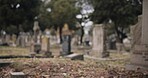 Graveyard, burial and tombstone in cemetery for death ceremony, funeral ritual and memorial service. Headstone, rip and resting place of departed for mourning, loss and remembrance of dead by church