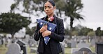 Funeral, rose and american flag with a woman at a cemetery in mourning at a memorial service. Sad, usa and an army wife as the widow of a patriot in a graveyard, feeling pain of death, loss or grief