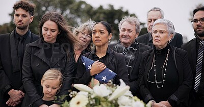 Buy stock photo Funeral, cemetery and family with American flag for veteran for respect, ceremony and memorial service. Sad, depression and people by coffin in graveyard for military hero, army and soldier mourning