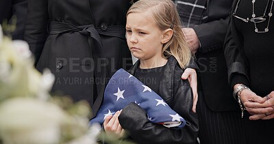 Buy stock photo Funeral, cemetery and child with American flag for veteran for respect, ceremony and memorial service. Family, depression and sad girl by coffin in graveyard mourning military, army and soldier hero