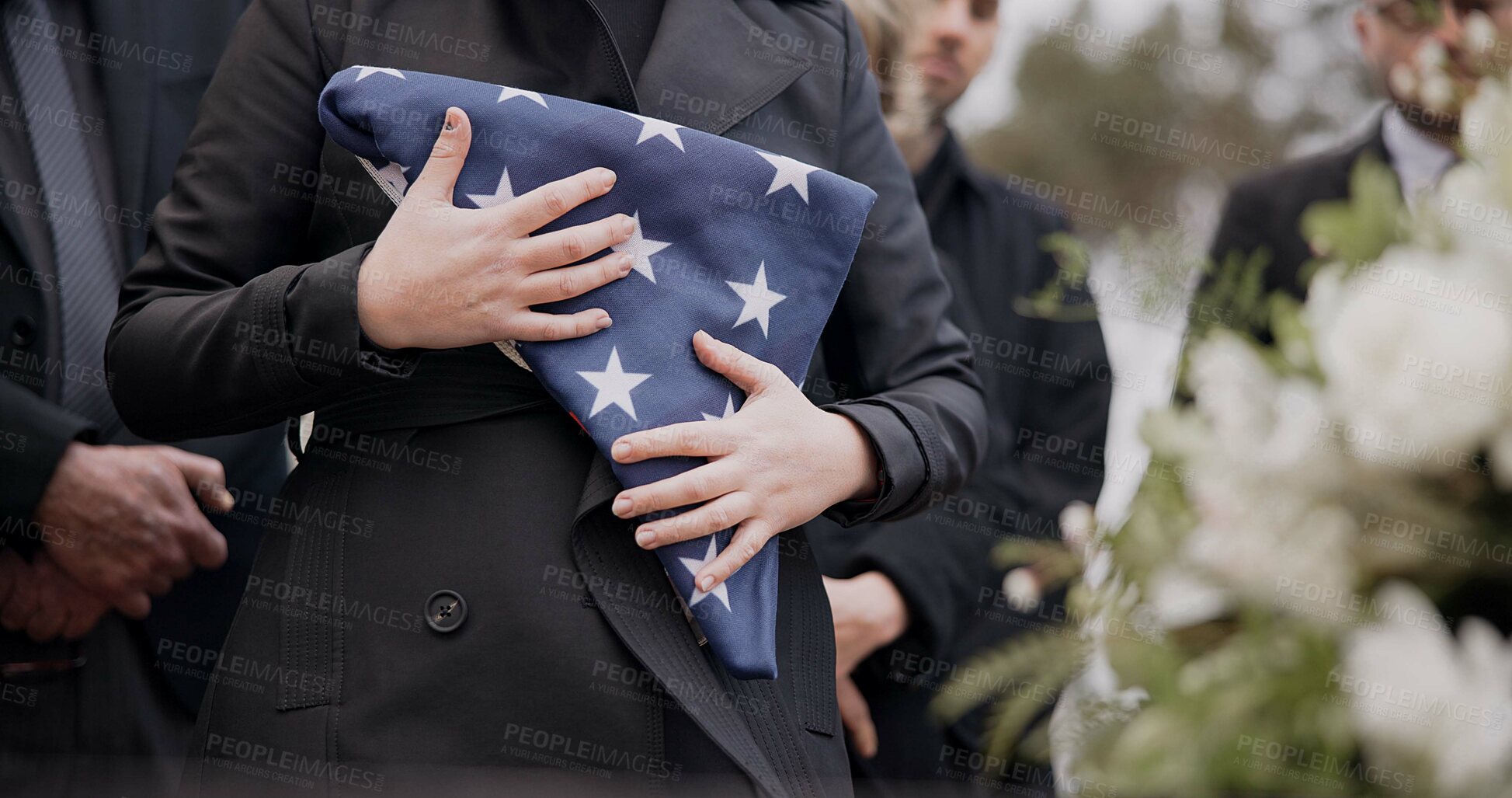 Buy stock photo Hands, american flag and death with a person at a funeral, mourning a loss in grief at a graveyard. War, cemetery and an army wife at a memorial service to say goodbye to a fallen soldier closeup