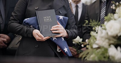 Buy stock photo Hands, american flag and bible with a person at a funeral, grieving a loss at a graveyard. War, cemetery and death with an army wife at a memorial service to say goodbye to a fallen soldier closeup